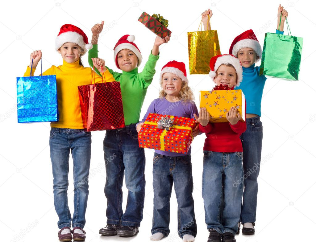Group Gift For Kids
 Group of happy kids with christmas ts — Stock