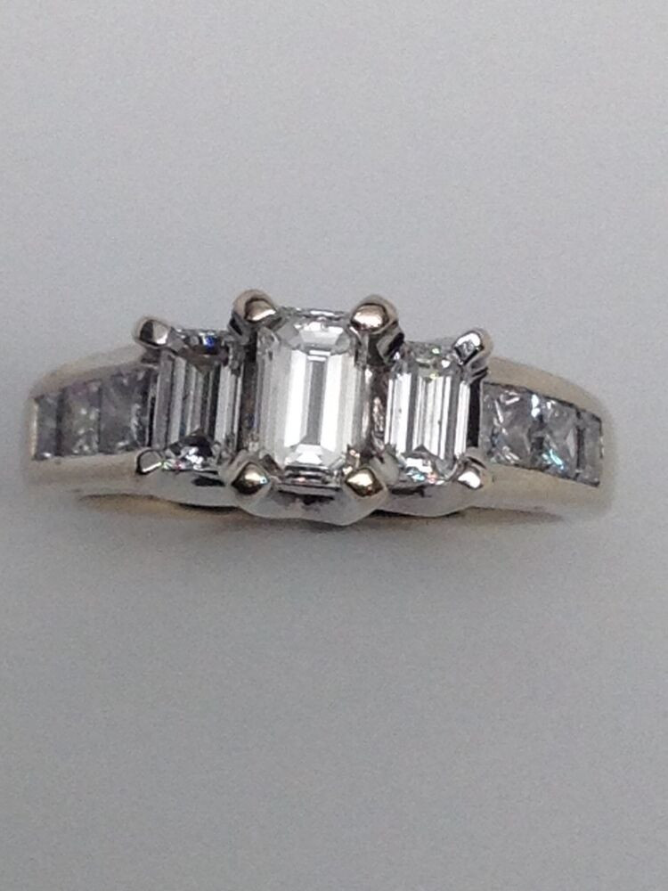 3 Stone Emerald Cut Diamond Engagement Rings
 18K White Gold Three Stone Emerald Cut and Princess Cut