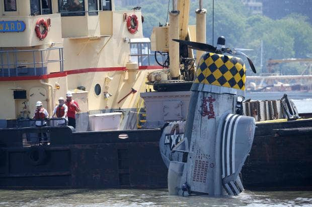 Backyard Flyer Crash
 Crews successfully lift wreckage of crashed plane from