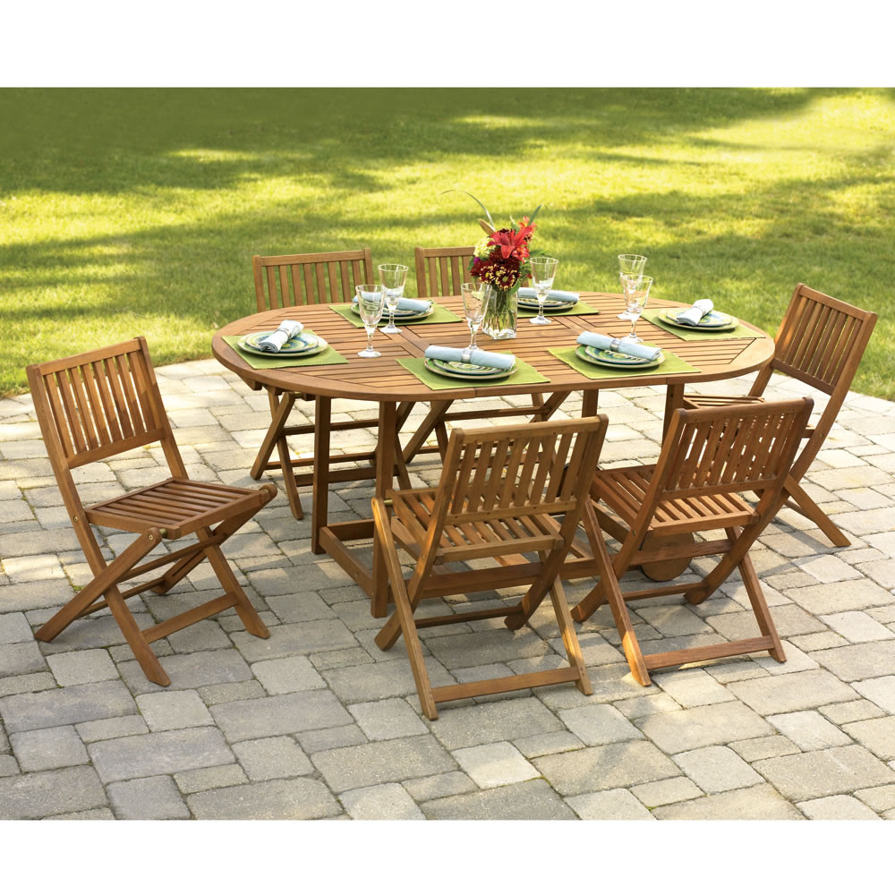 Backyard Table And Chairs
 The Gateleg Patio Table And Stowable Chairs Hammacher