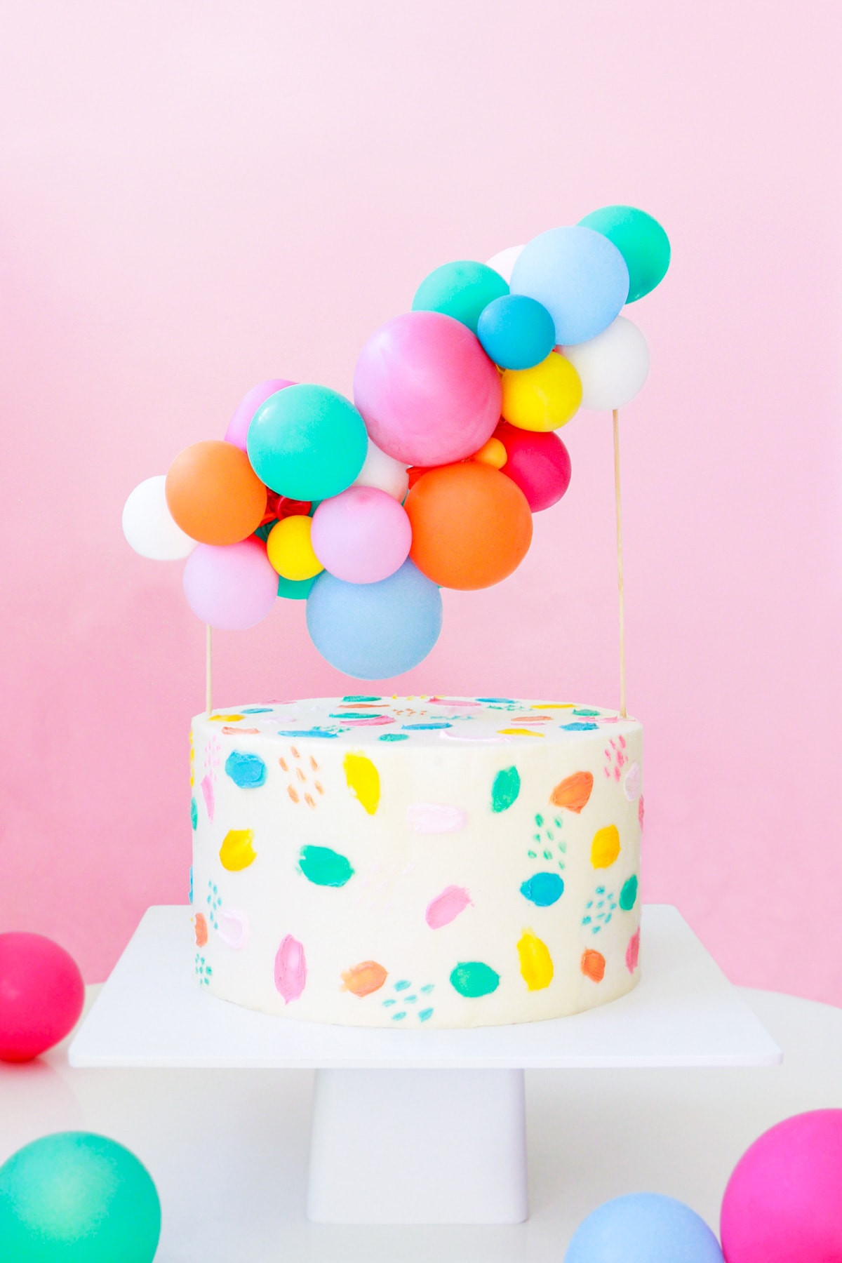 Balloon Birthday Cake
 DIY Balloon Garland Cake Topper and Tips for Painting Frosting