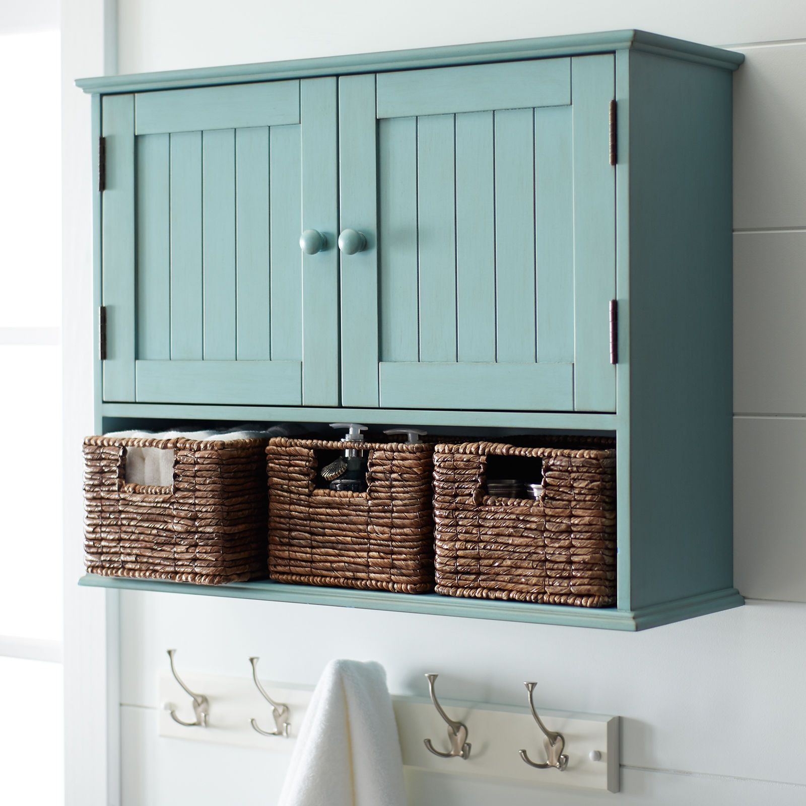 Bathroom Wall Cabinet With Baskets
 Storage doesn t have to be stark Our handsome wood