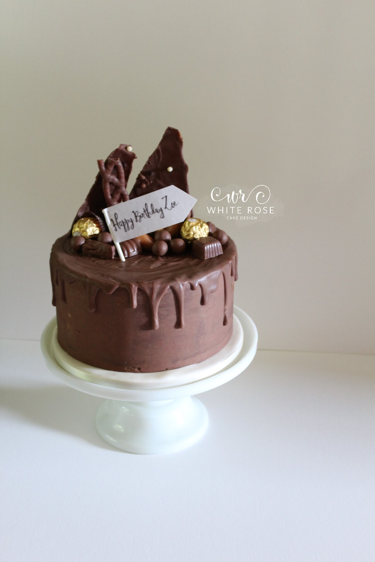 Birthday Cake Maker
 Chocolate Drippy Birthday Cake by White Rose Cake Design