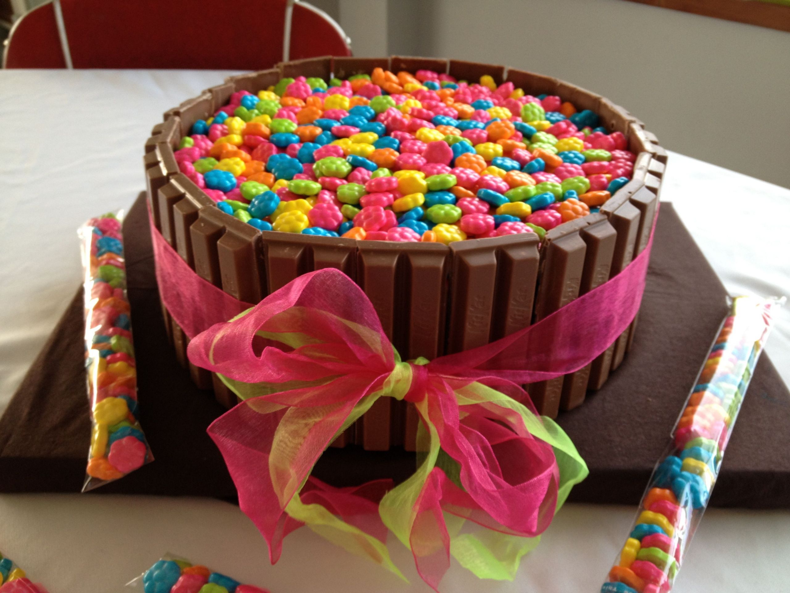 Birthday Party Ideas For 13 Year Old Boy
 Kit Kat Cake with Mini Flower Can s for my 13 year old s