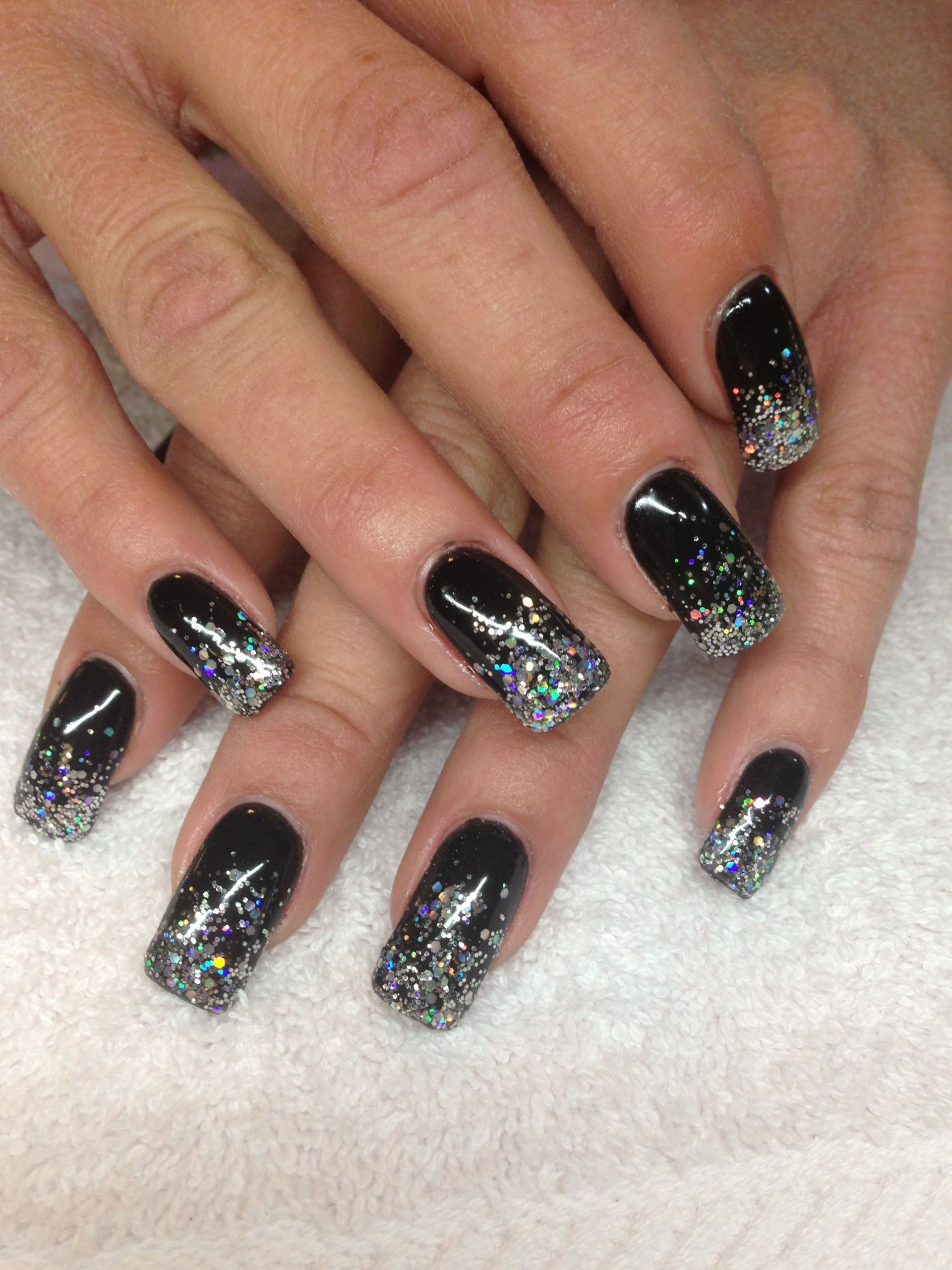 Black And Silver Glitter Nails
 Black and silver nails