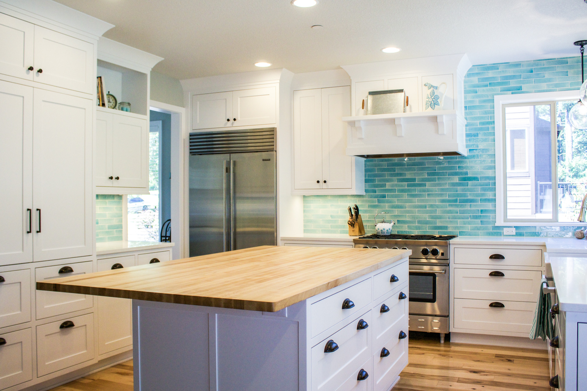 Blue White Kitchen
 Custom designed kitchen with white cabinets and bold blue