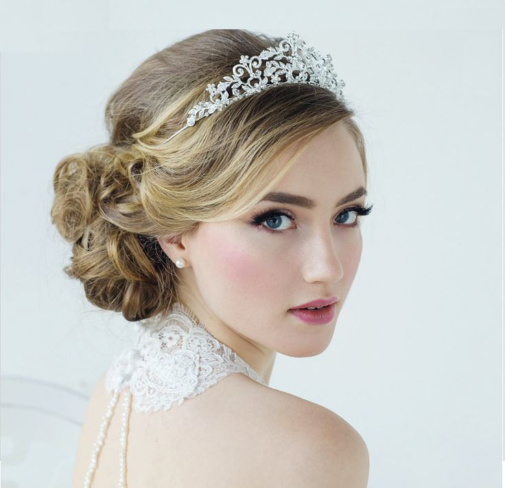 Brides Hairstyles With Tiara
 240 best images about Fabulous Tiaras for your Wedding or