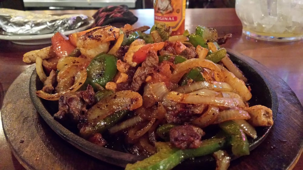 Chicken And Shrimp Fajitas
 Texana Fajitas Featuring Steak Chicken and Shrimp