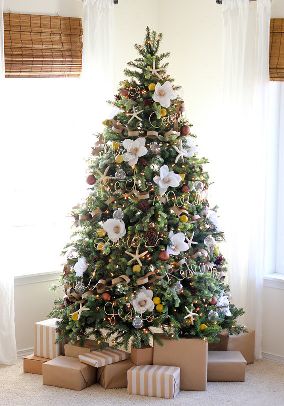 Christmas Flower Decorations
 She Tucks A Giant Flower Into Her Tree When The Camera