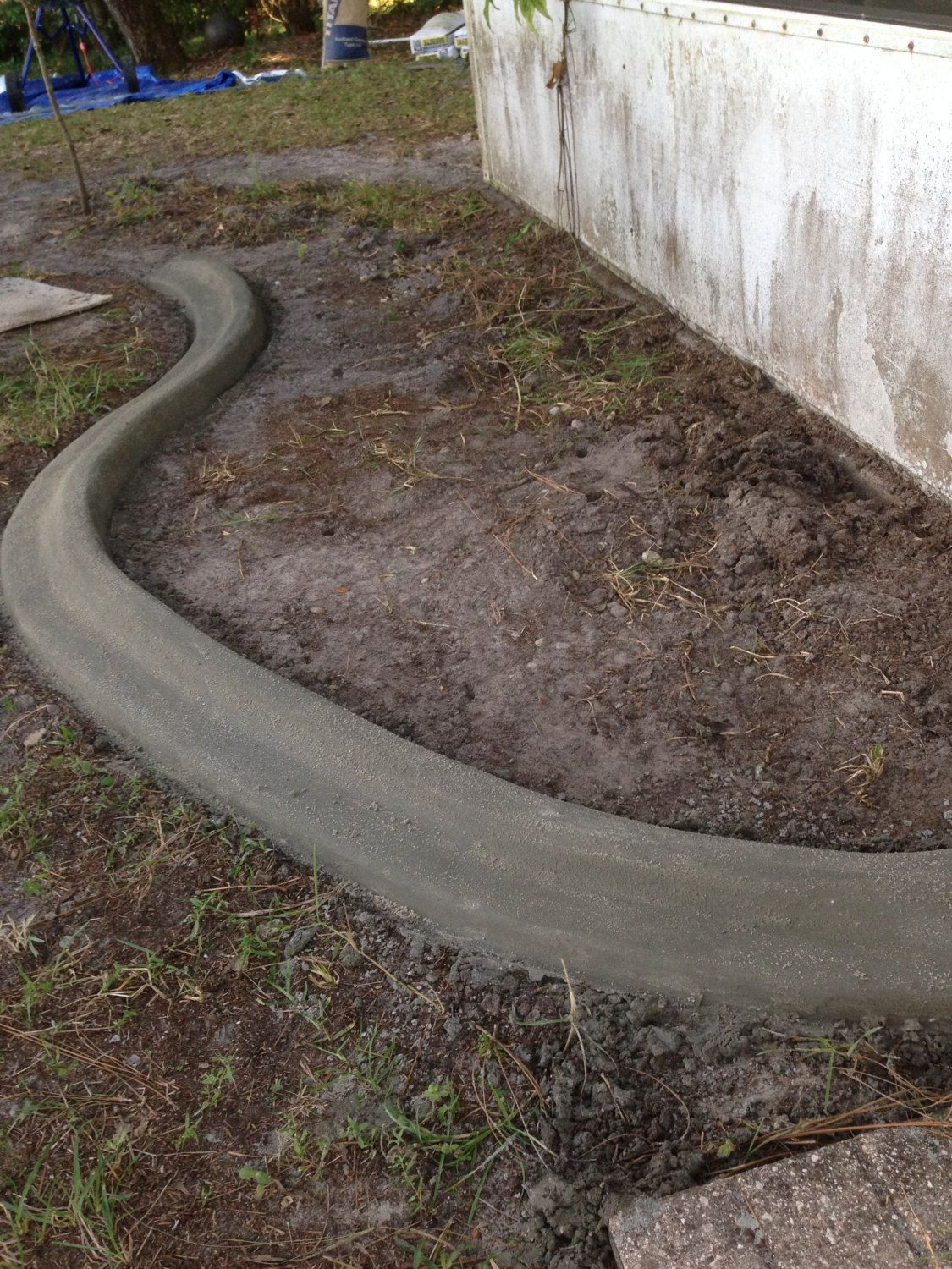 Concrete Landscape Edging Cost
 Custom concrete curbing edging landscaping do it yourself