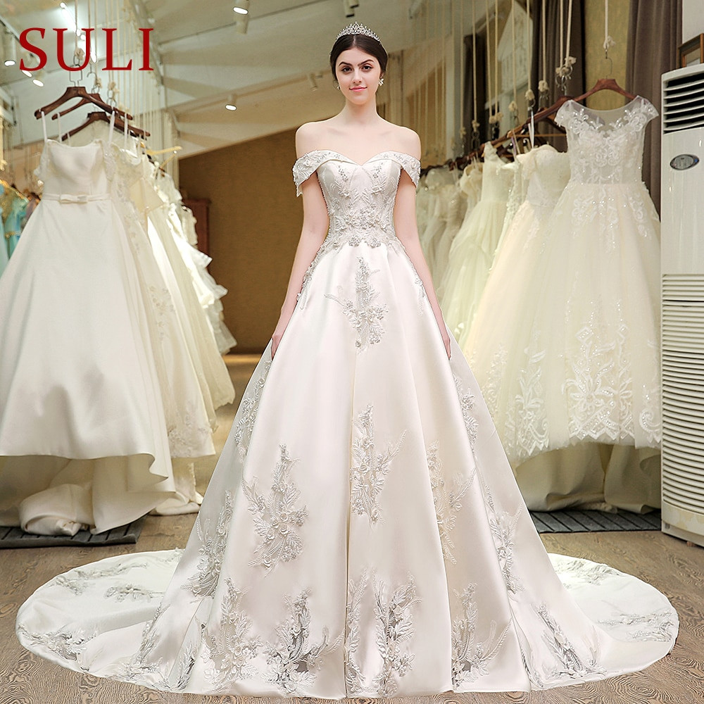 Custom Wedding Gowns
 SL 83 Designer Wedding Bridal Gowns Satin Embroidered