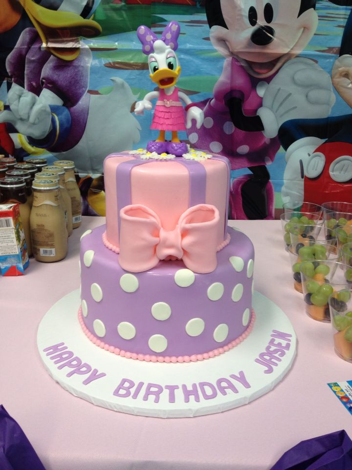 Daisy Duck Birthday Cake
 Daisy Duck cake in pink and purple Cake by TracyCakesAR