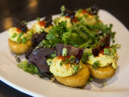 Deep Fried Deviled Eggs With Bacon
 The Local Goat restaurant scales the mountain of success