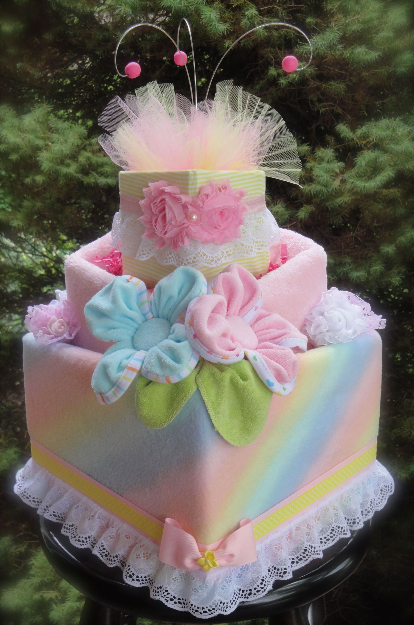 DIY Baby Shower Diaper Cakes
 Slanted Girl s Diaper Cake