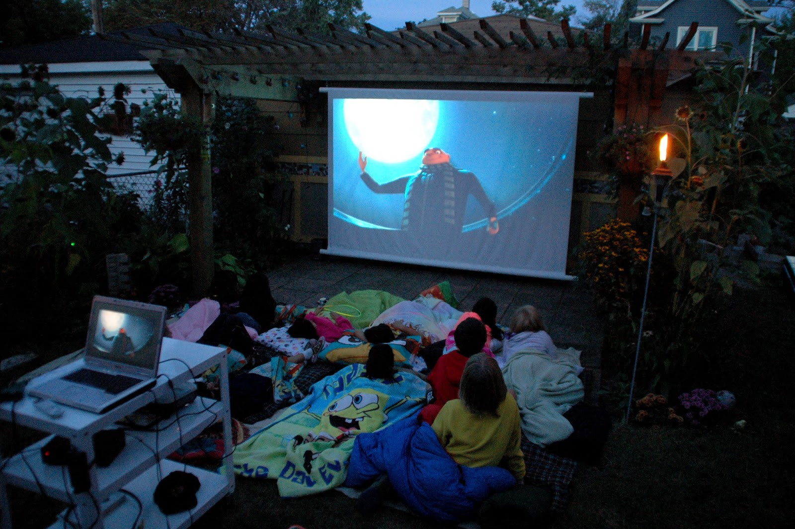 Diy Backyard Movie Screen
 Our Tiny Oak Park Bungalow DIY Outdoor Movie Screen