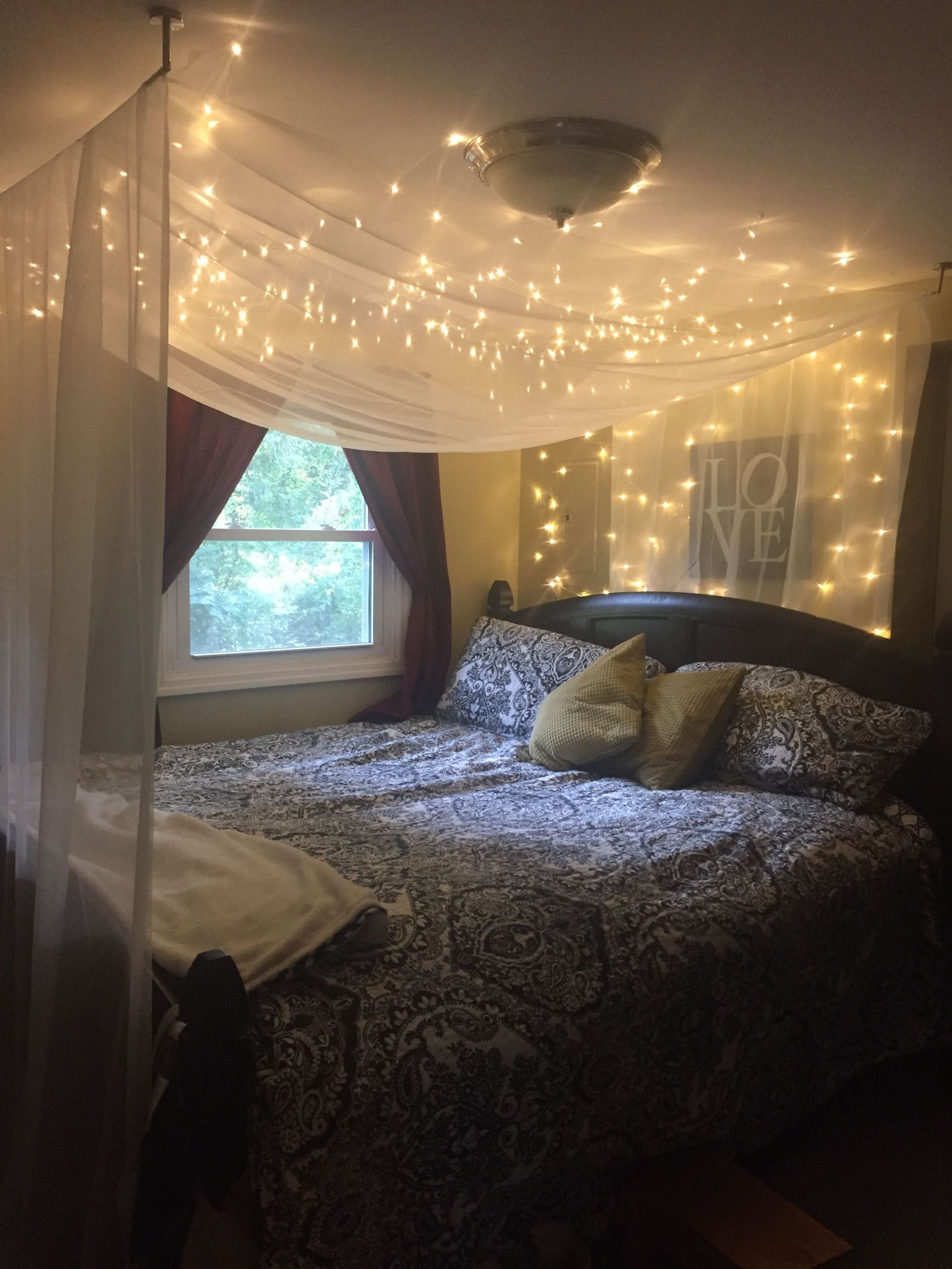 Diy Bedroom Canopy With Lights
 Bedroom with black and white forter yellow accents