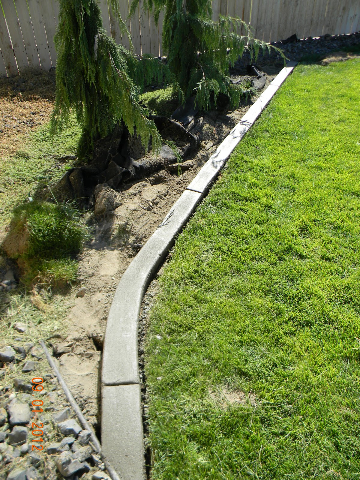 Diy Concrete Landscape Edging
 Home Is Where They Love You DIY Landscaping Curb