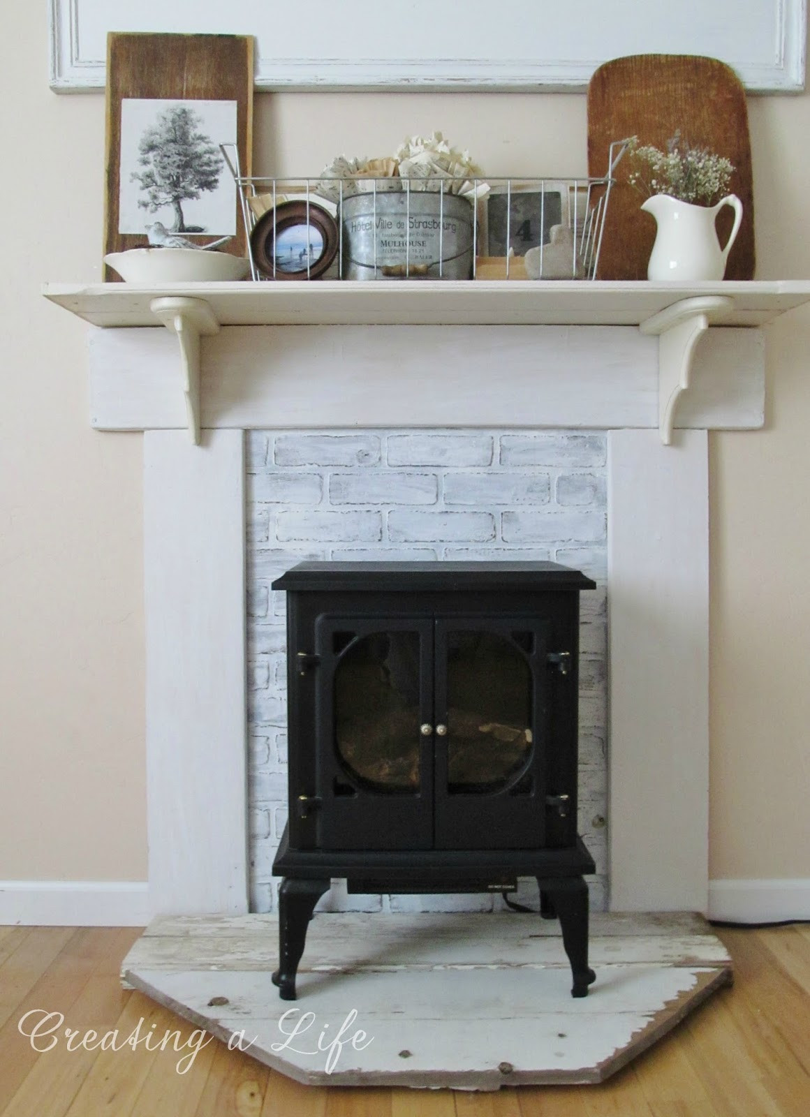 Diy Electric Fireplace Mantel
 Creating A Life DIY Faux Mantel Update