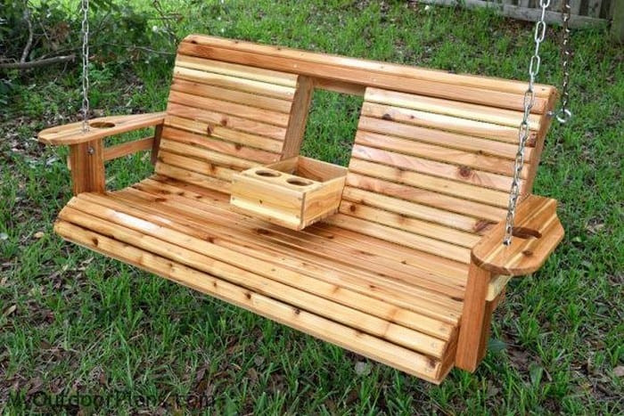 DIY Wooden Swing
 Unwind in your yard with a DIY wood porch swing with cup