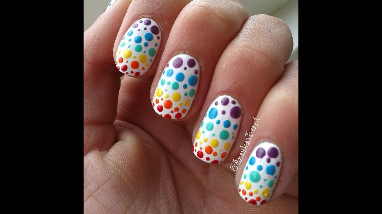 Dot Nail Art
 Colorful polka dots nail art