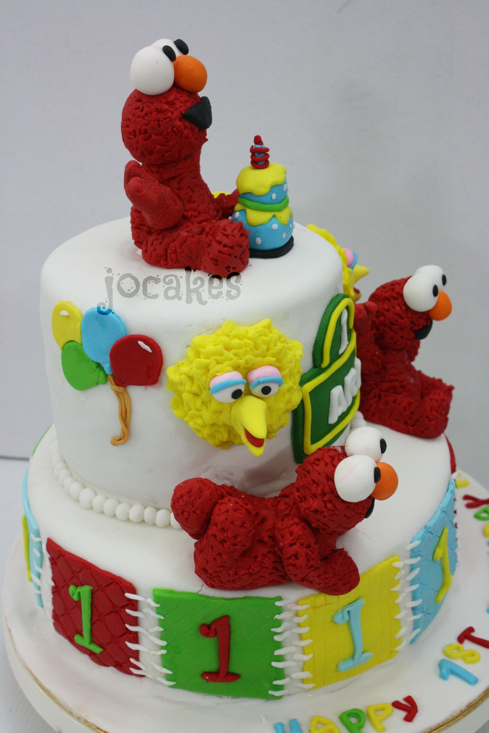 Elmo 1st Birthday Cake
 Elmo cake and cupcakes for Ari 1st birthday