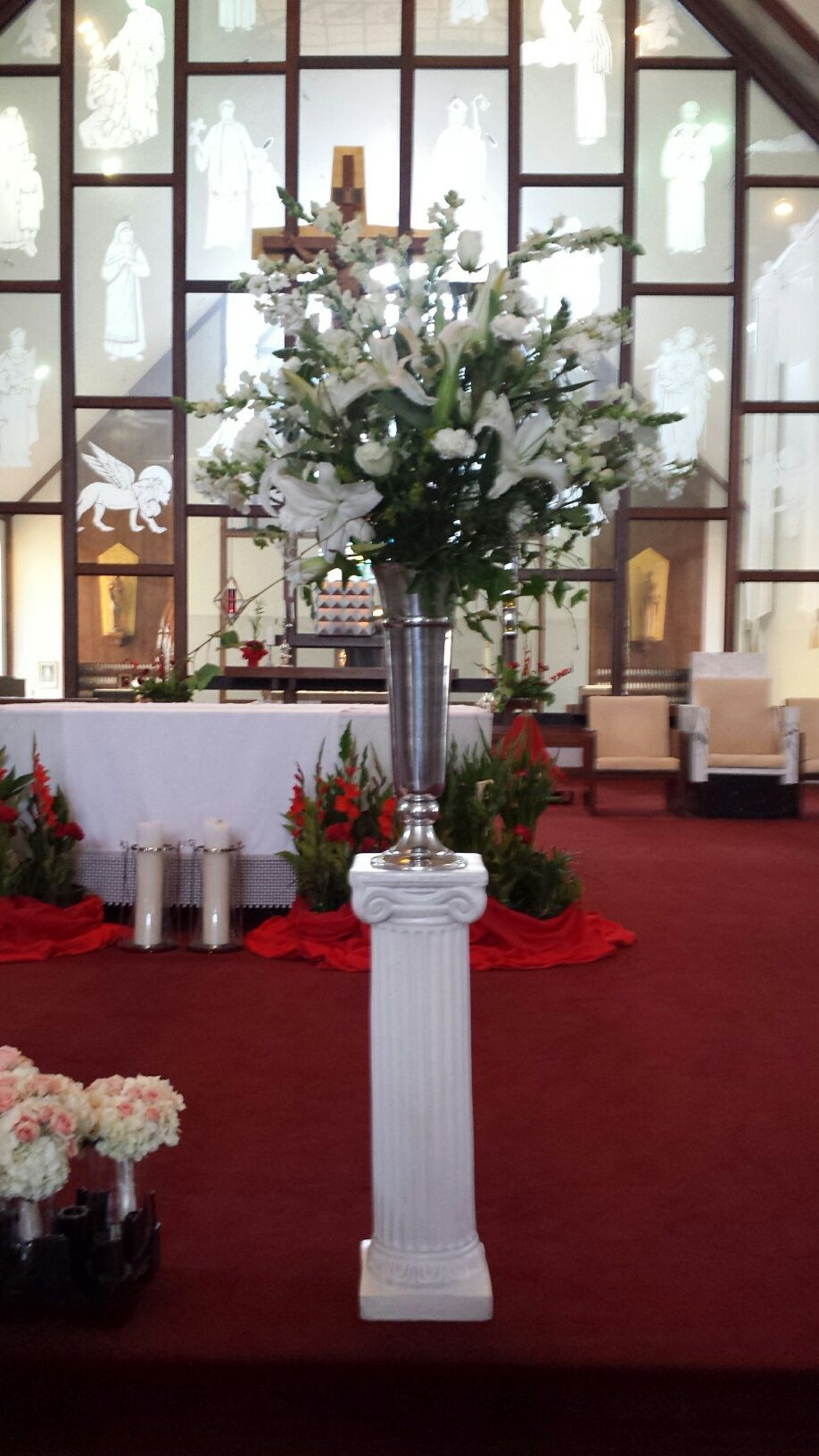 Enchanted Beach Weddings
 Catholic Church Alter Piece Weddings in South West Florist