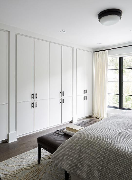 Floor To Ceiling Cabinets Bedroom
 Wall of Floor to Ceiling Closet Cabinets Modern Bedroom