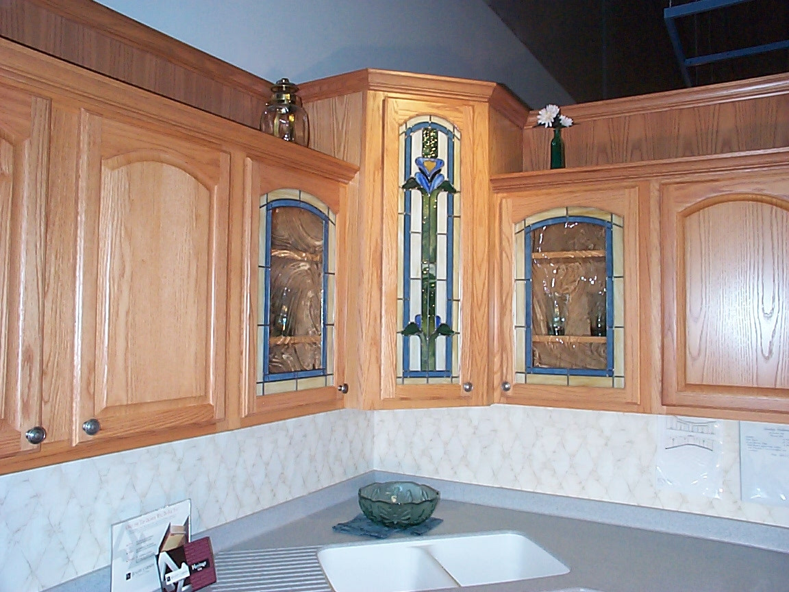 Glass Door Kitchen Wall Cabinets
 Kitchen Corner Cabinet with Clever Storage Systems Inside
