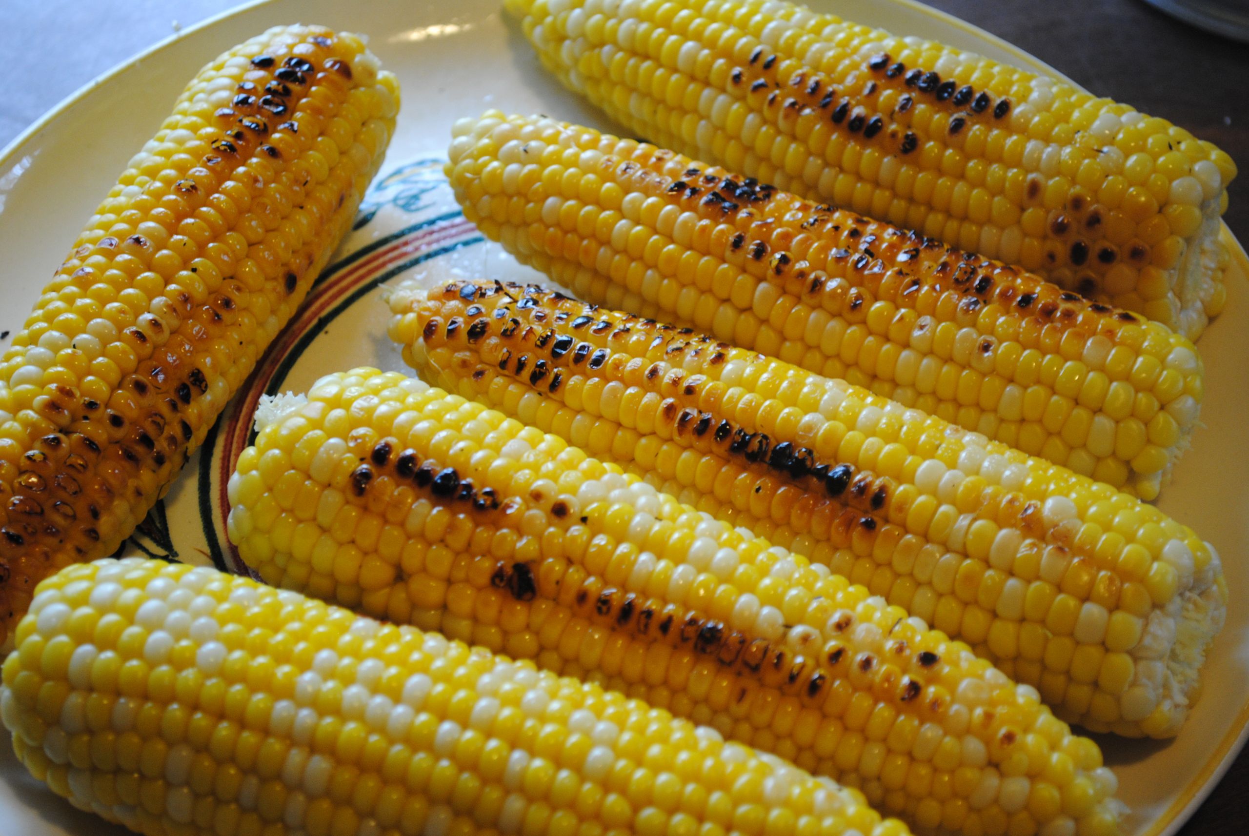 Grilling Corn On The Cob
 GRILLED CORN ON THE COB IN THE HUSKS