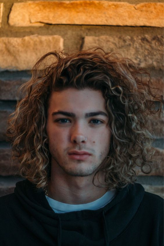 Haircuts For Boys With Curly Hair
 30 New Stylishly Masculine Curly Hairstyles For Men