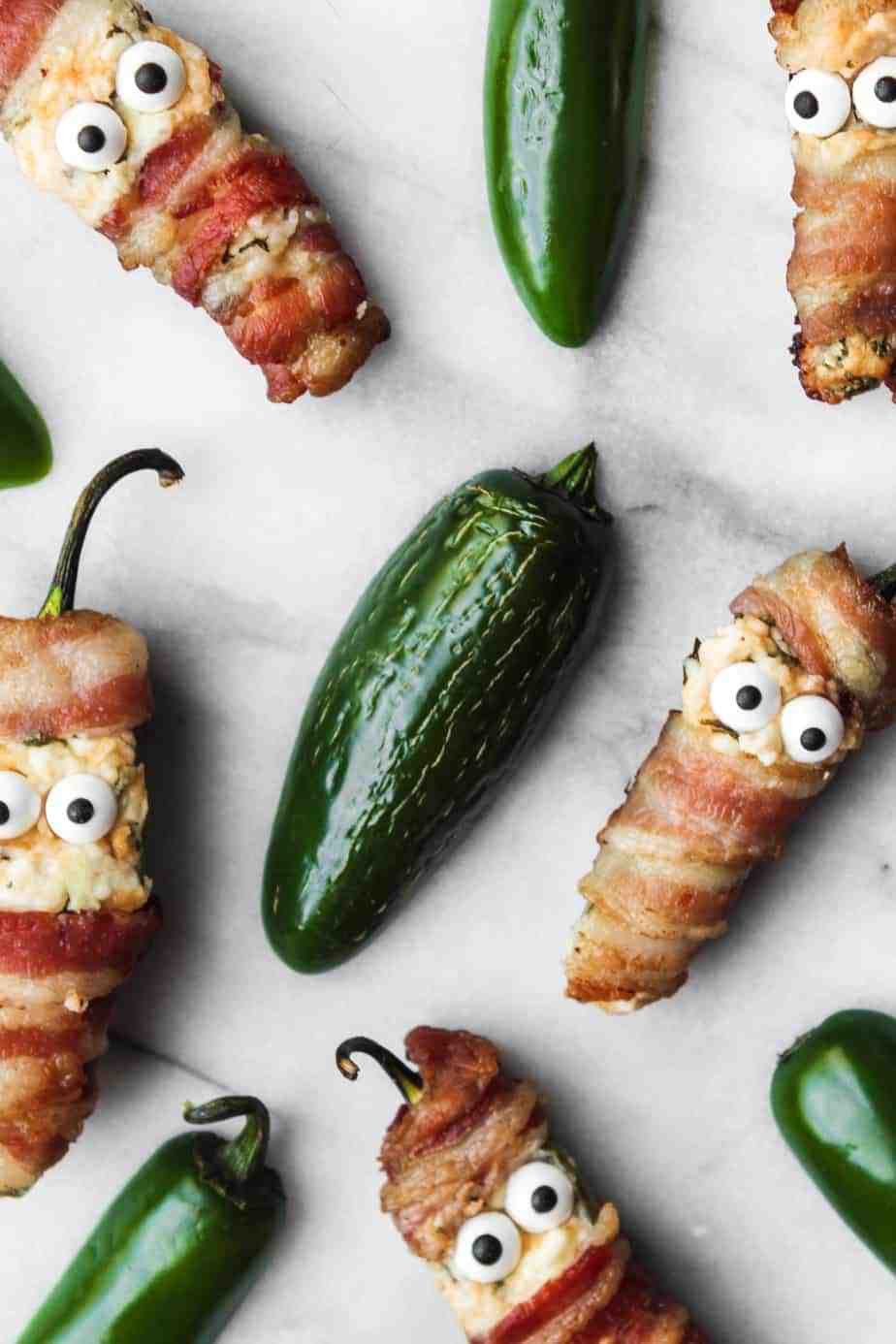 Halloween Jalapeno Poppers
 bacon wrapped jalapeno popper mummies