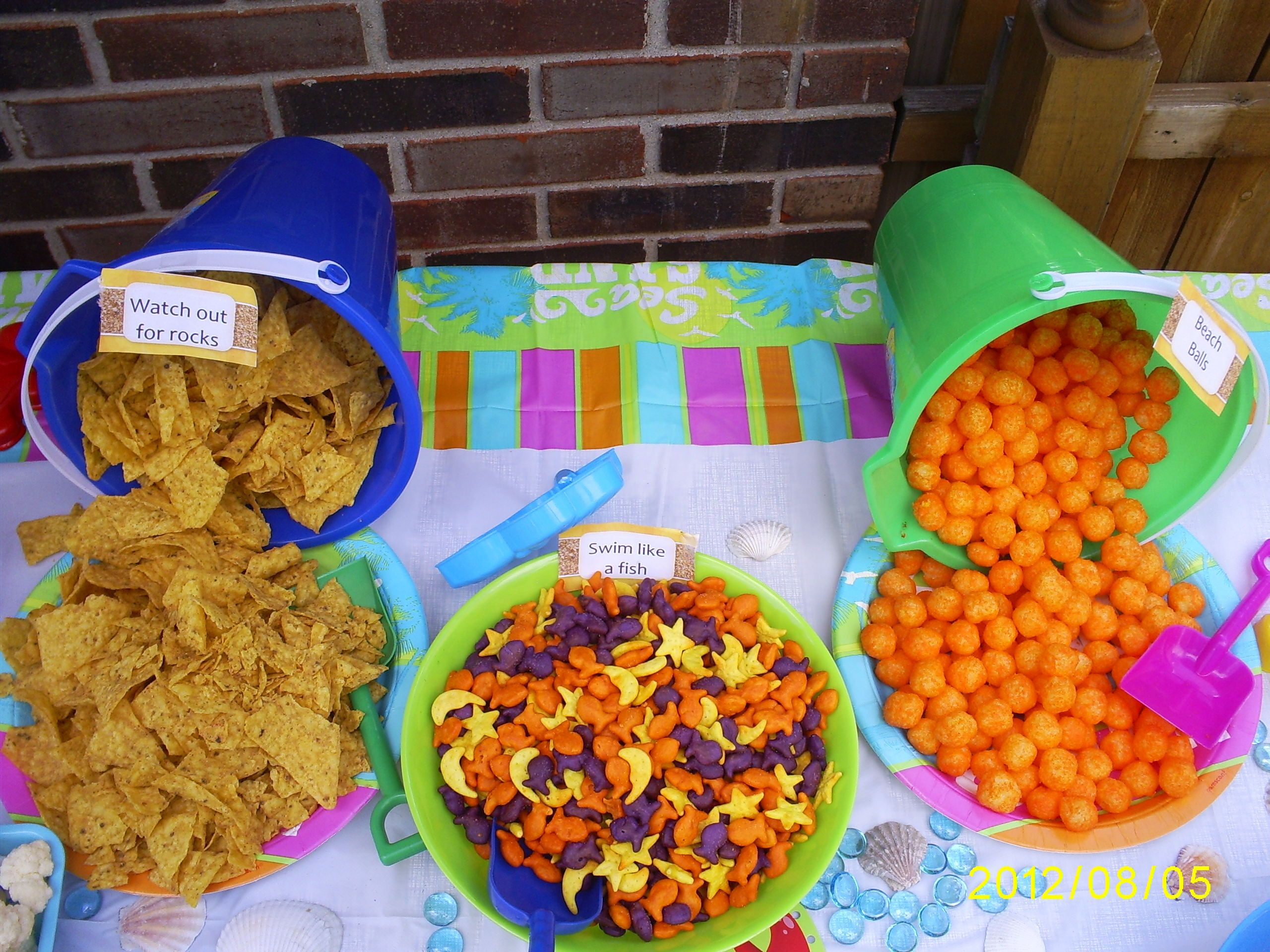 Kids Pool Party Food
 pool party food= Doritos gold fish cheese puffs