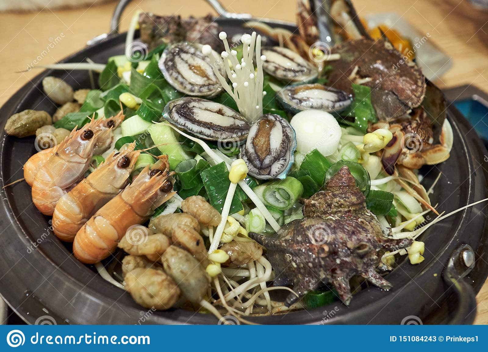 Korean Seafood Stew
 Hot Korean Seafood Stew With Various Ingre nts Including