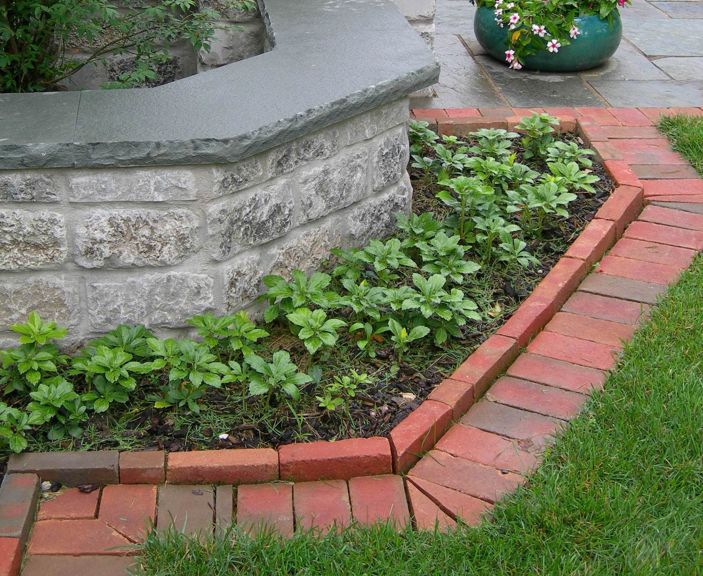 Landscape Edging Bricks
 Brick edging mimics the wall