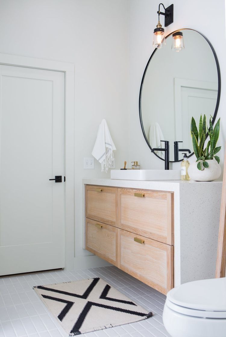 Large Round Bathroom Mirror
 big round mirror in bathroom with white oak vanity and