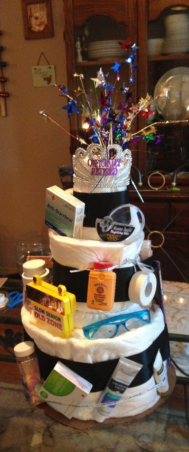 Male Retirement Party Ideas
 Adult Diaper cake slippers lotion reading glasses gas