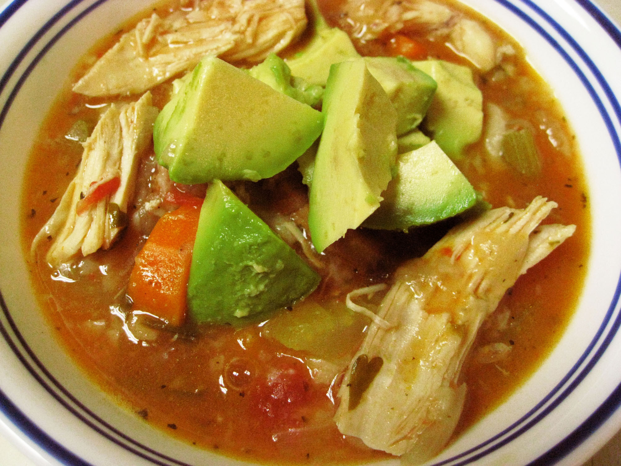 Mexican Chicken Soup With Rice And Avocado
 mexican soup with avocados