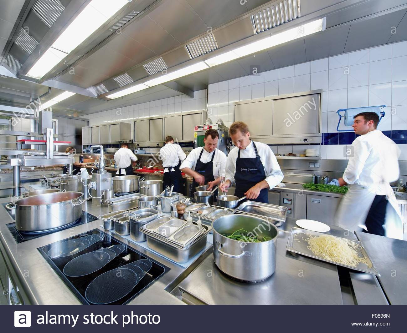 Modern Kitchen Restaurant
 Chefs working in modern kitchen of the restaurant Aqua