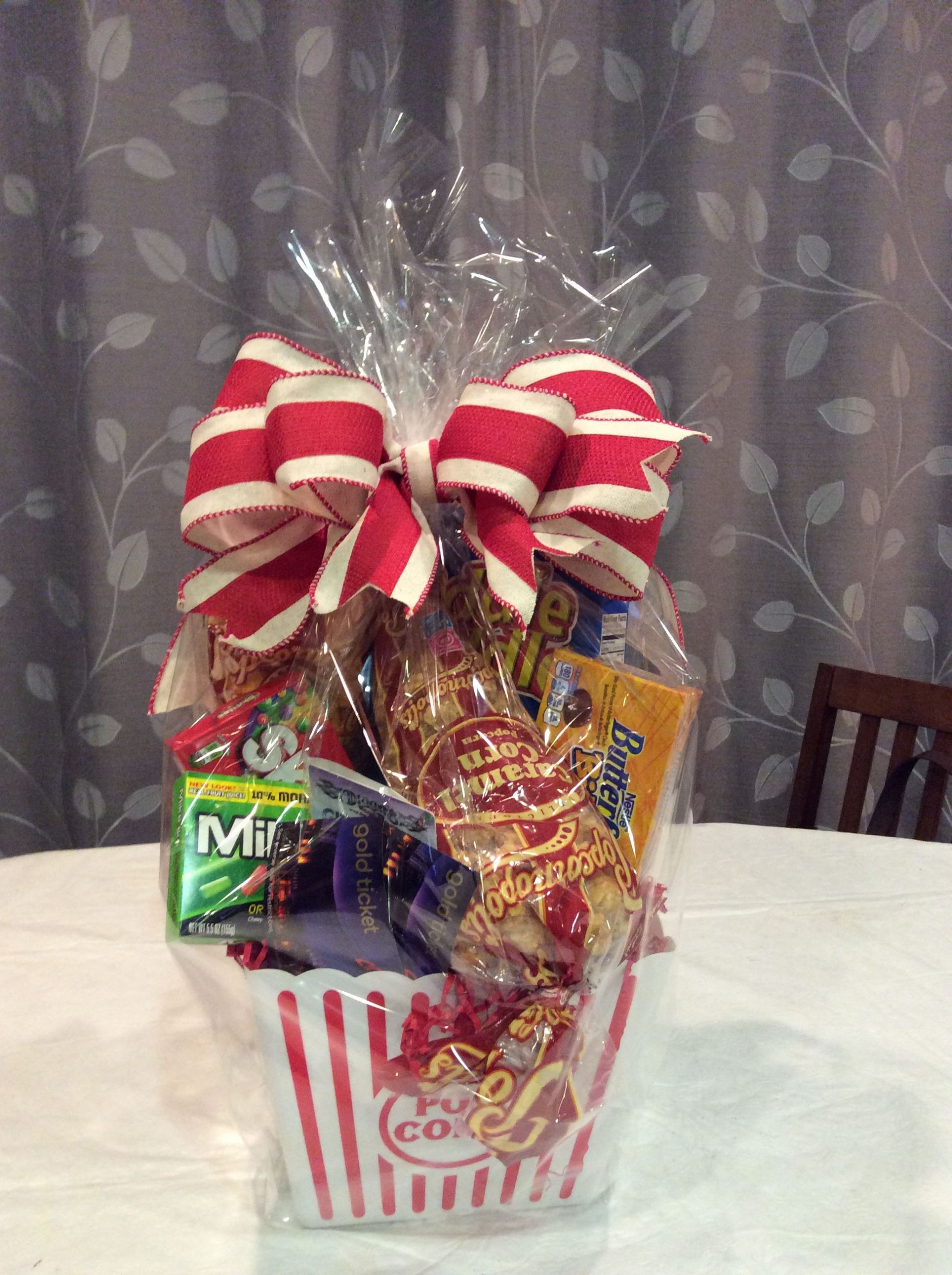 Movie Ticket Gift Basket Ideas
 Dinner and a movie basket with 2 movie tickets and t
