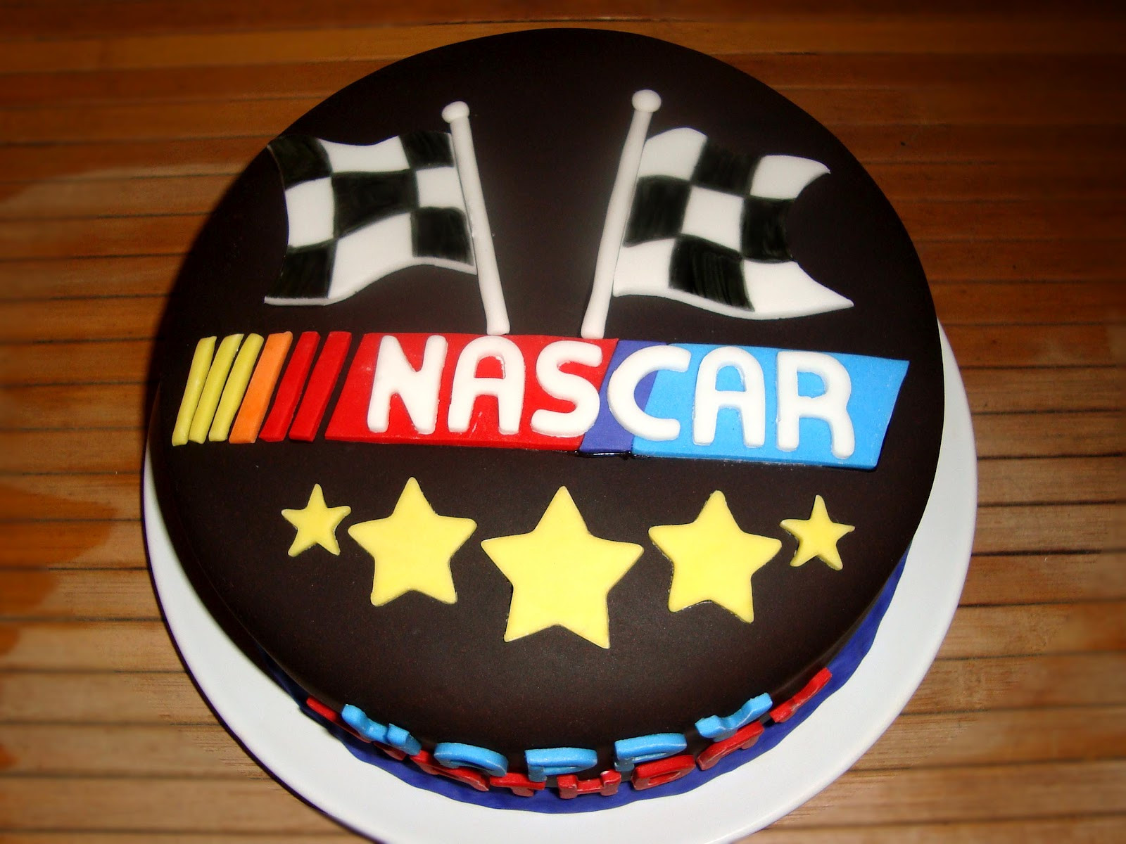 Nascar Birthday Cake
 Sugar Butter Baby Revved Up Nascar Cake