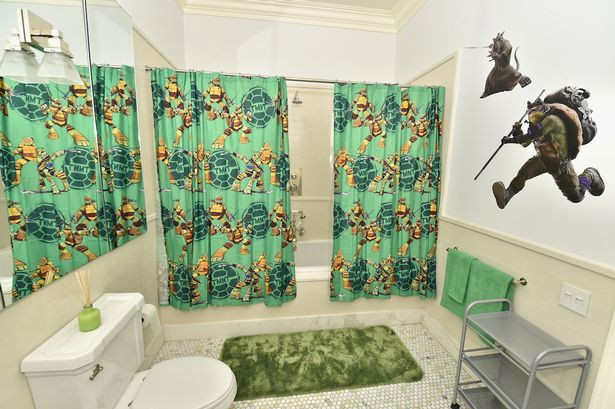 Ninja Turtles Bathroom Decor
 Airbnb with Teenage Mutant Ninja Turtle theme has glow in