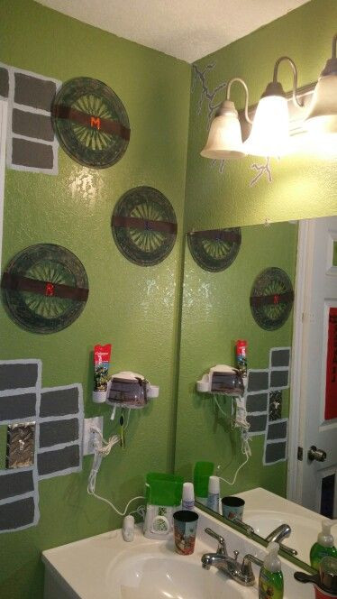 Ninja Turtles Bathroom Decor
 Turtle shells made out of paper plate holders