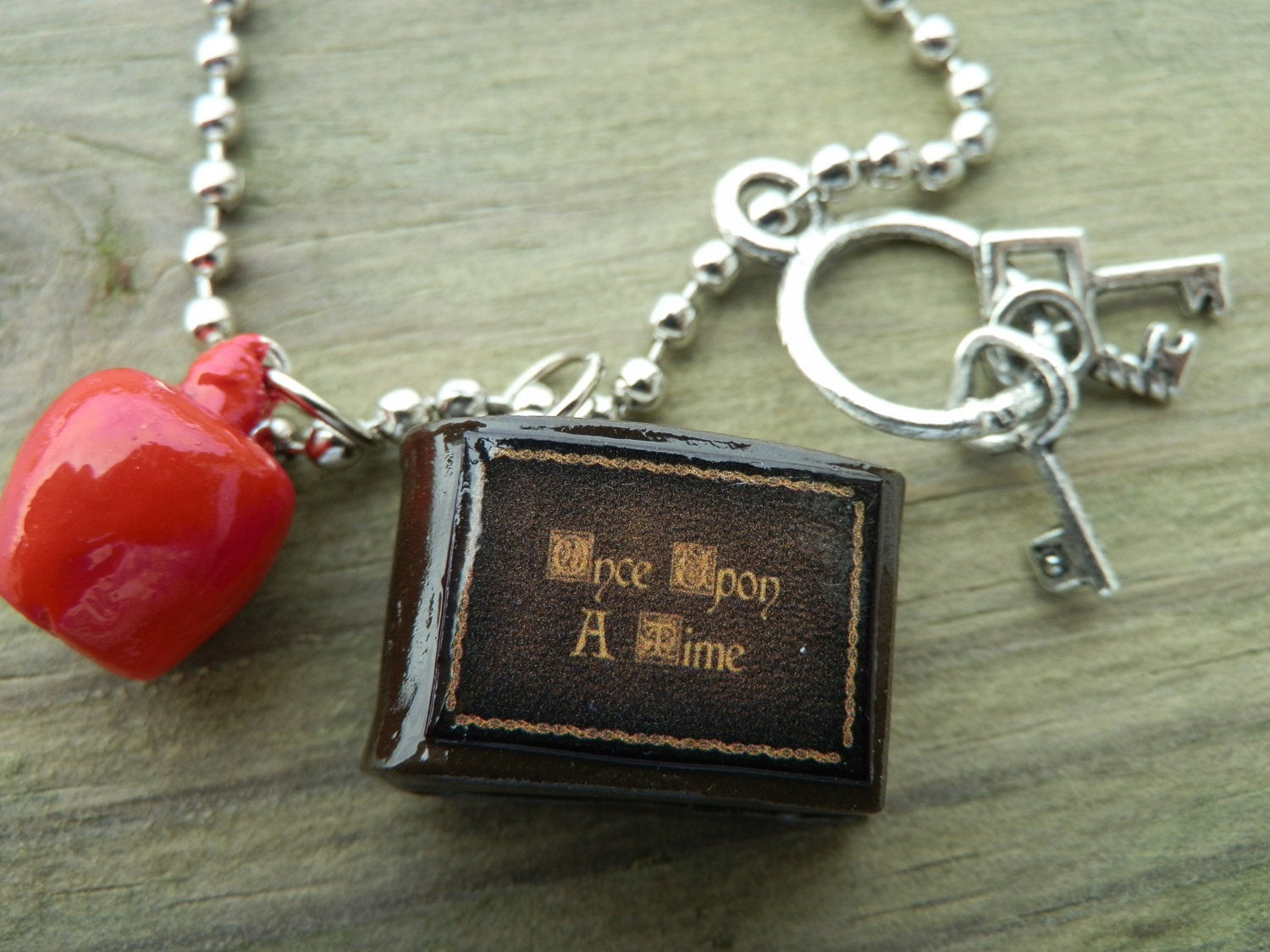 Once Upon A Time Necklace
 ce Upon A Time Necklace Henry s Book The Poison Apple