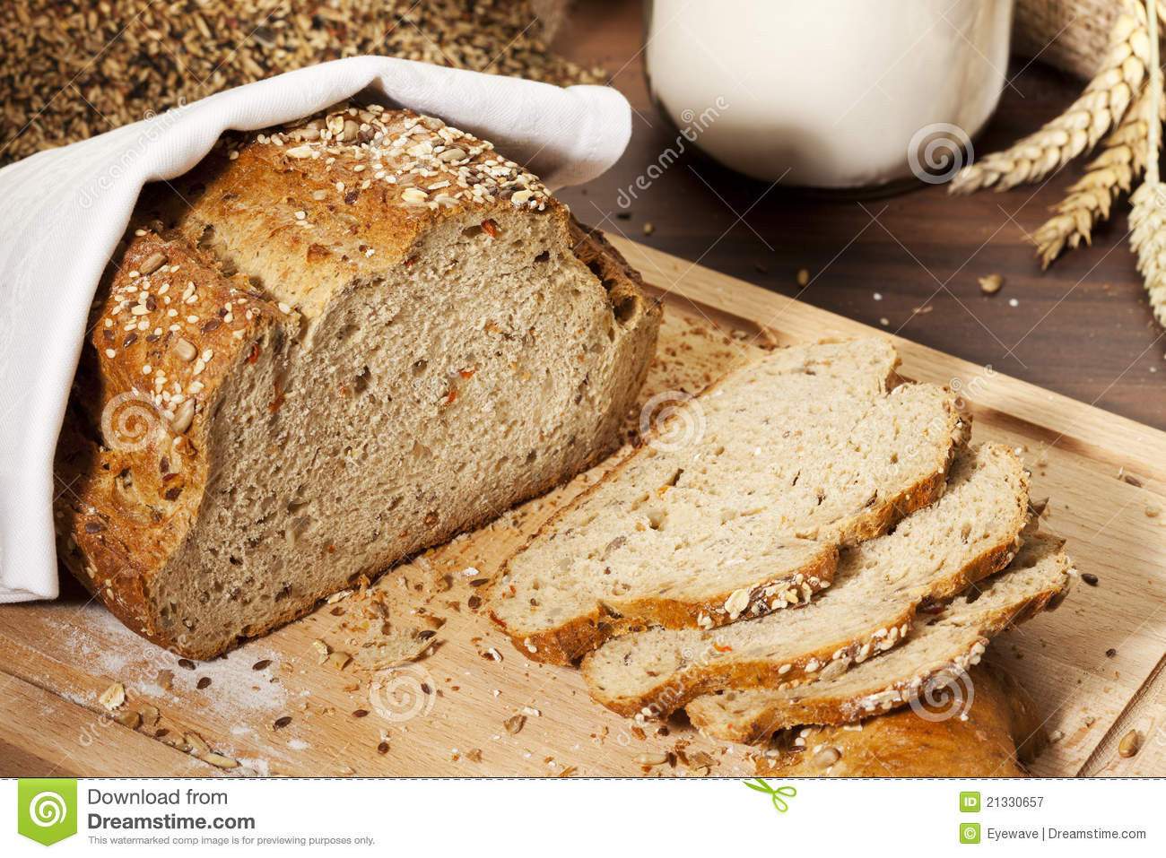 Organic Whole Grain Bread
 Organic Whole Grain Bread Loaf And Slices Stock Image