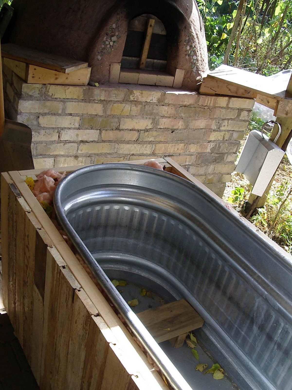 Outdoor Bathtub DIY
 Little City Farm Affordable homemade wood fired hot tub