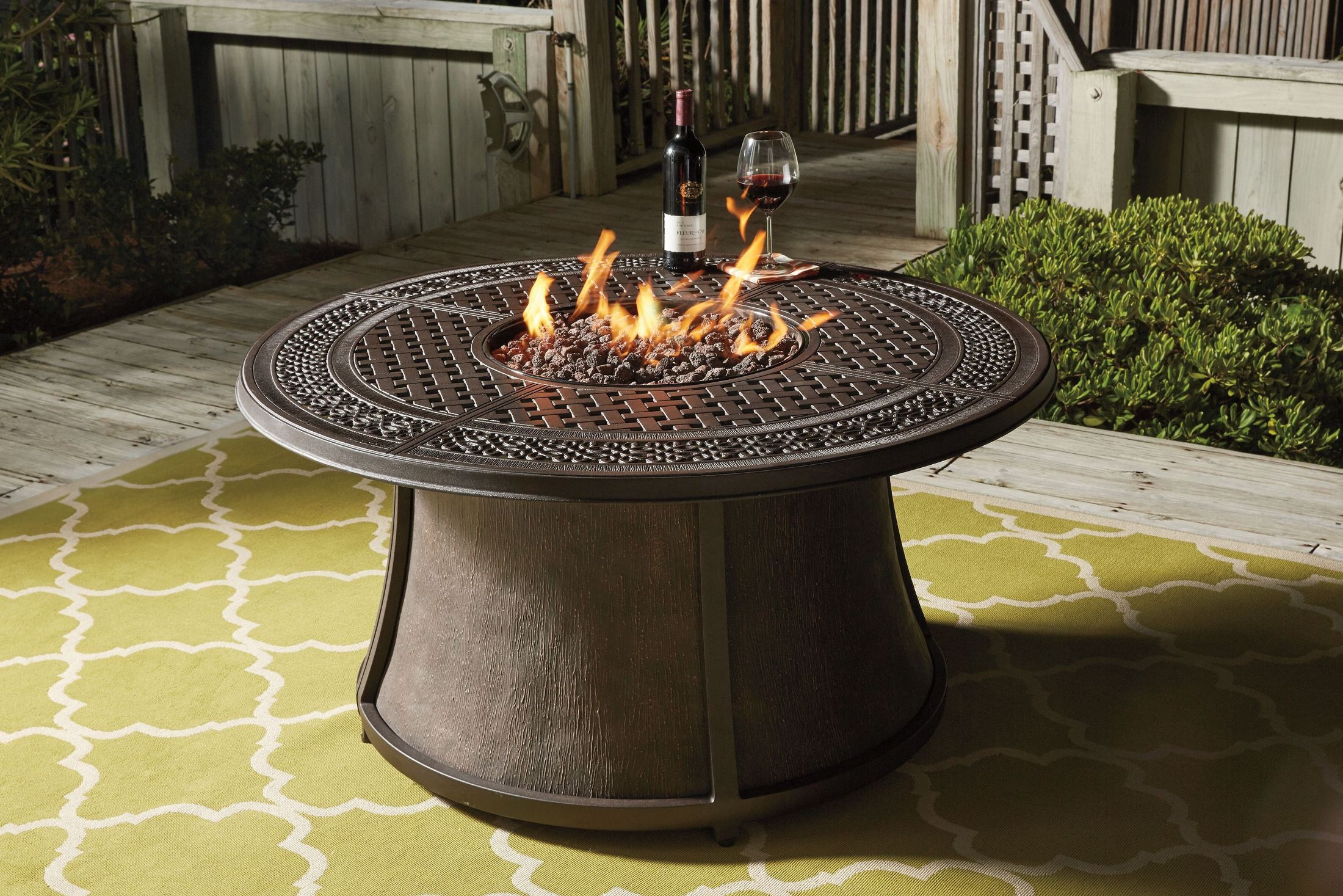 Patio Table With Fire Pit
 Burnella Round Outdoor Fire Pit Table from Ashley