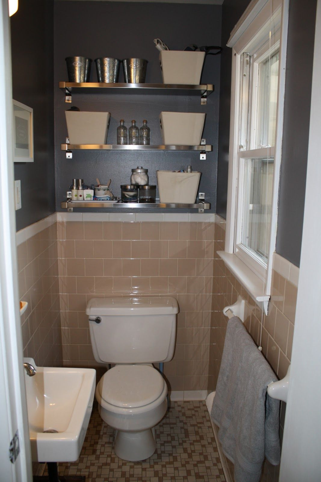 Peach Tile Bathroom
 Peach tile bathroom with grey walls plus fun shiny shelves