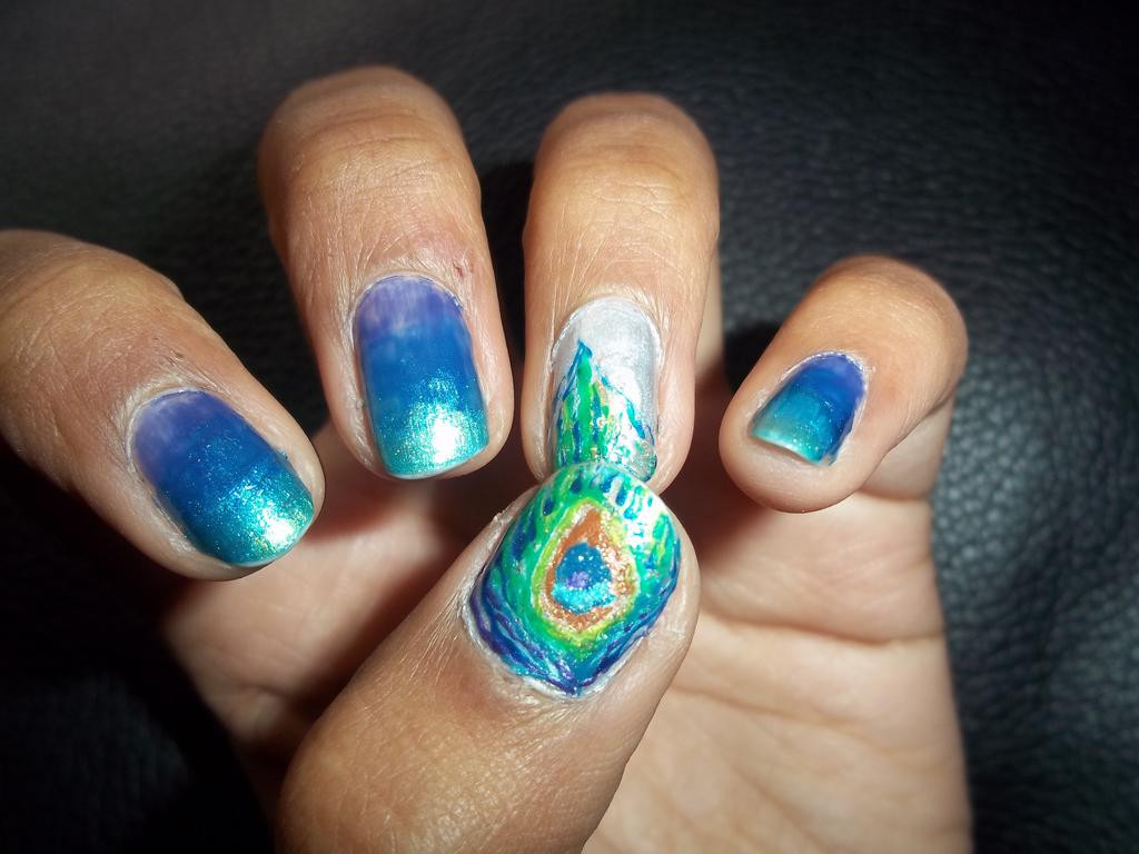 Peacock Feather Nail Art
 peacock feather nails by krishnails on DeviantArt