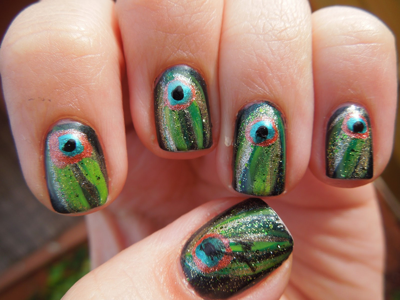 Peacock Feather Nail Art
 Pretty In Polish Peacock feather inspired nail art