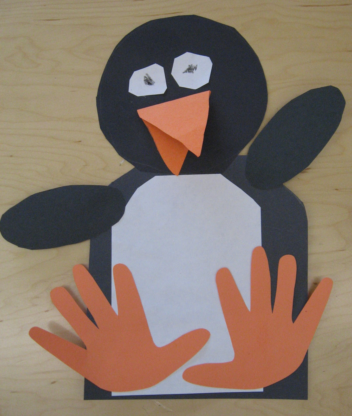 Penguin Craft For Preschoolers
 handprint penguins rubber boots and elf shoes